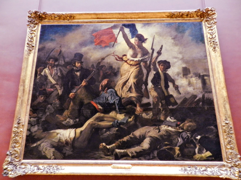 "A liberdade liderando o povo" de Eugène Delacroix Louvre em Paris